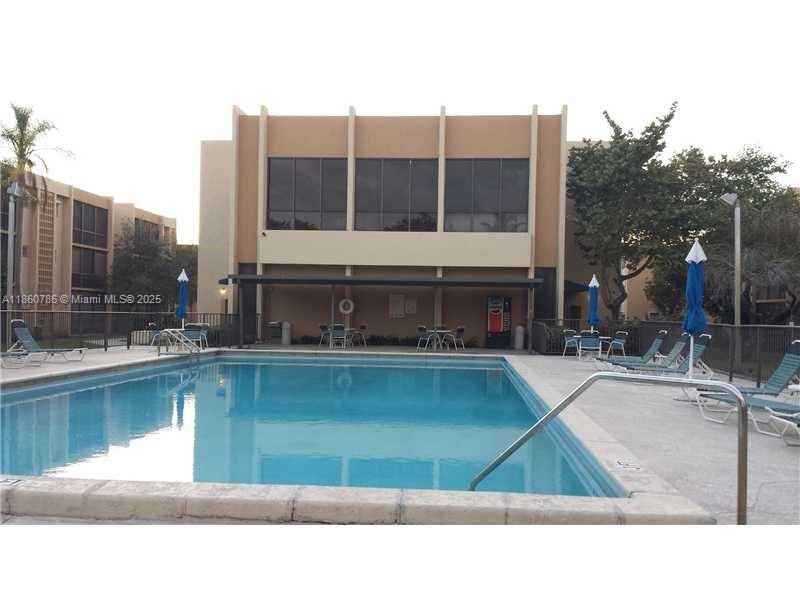 Large 2-bedroom 2-bath condo in Kendall Acres West. Tiles in the living area and laminate wood floor in the bedroom. Laundry room with full-size washer and dryer in the unit, plenty of storage, located on the 3rd floor with screen balcony and garden view. Community offers 2 pools, 2 tennis court, and a clubhouse.