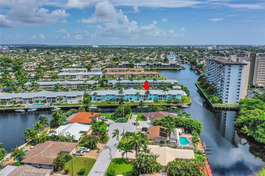 Reduced to sell! Incredible waterfront  views of both sunrises and sunsets from this 2nd floor All Age Co-op.  Cypress Island is a quiet waterfront boutique community that offers boat dockage at just $1.50 per ft/per mo. for up to 31' overall length with just one fixed bridge between your backyard and the ocean. Interior features include an updated kitchen, high impact windows, recently installed White Pine luxury vinyl flooring throughout with new baseboards, 6 ceiling fans, enclosed balcony with wall to wall/ floor to ceiling high-impact glass that adds a extra sun room.  As a bonus there is also a spacious sitting area in front of the unit. Located on a quiet cal-de-sac near shopping, dining,Pompano Beach and more! Schedule your private tour today and indulge in the waterfront lifestyle