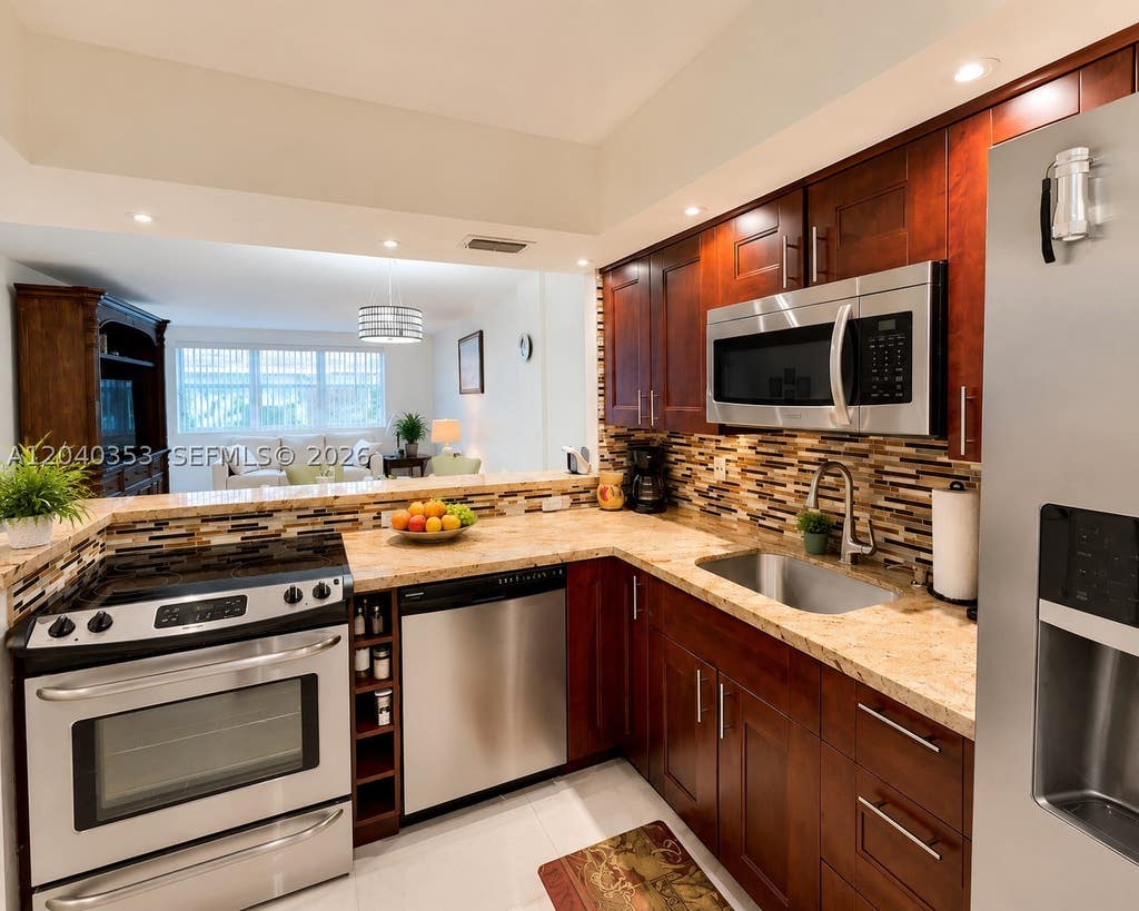 Photo of 1333 E Hallandale Beach Blvd #106, Hallandale Beach, FL 33009 (MLS # A12040353)
