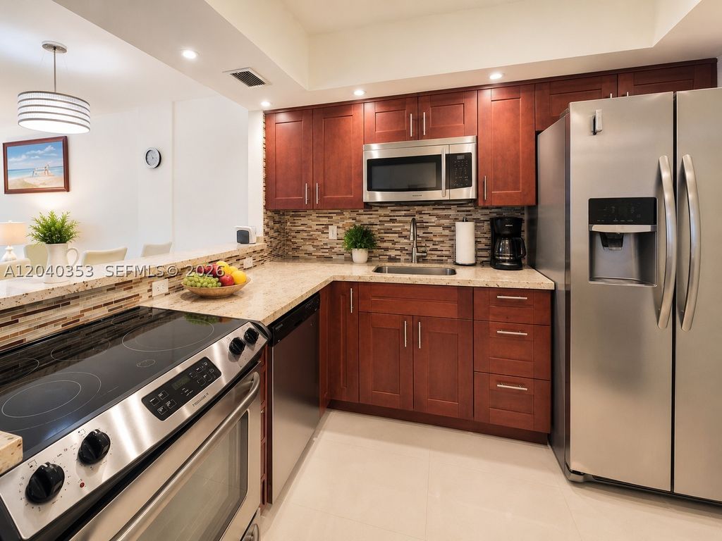 Photo of 1333 E Hallandale Beach Blvd #106, Hallandale Beach, FL 33009 (MLS # A12040353)