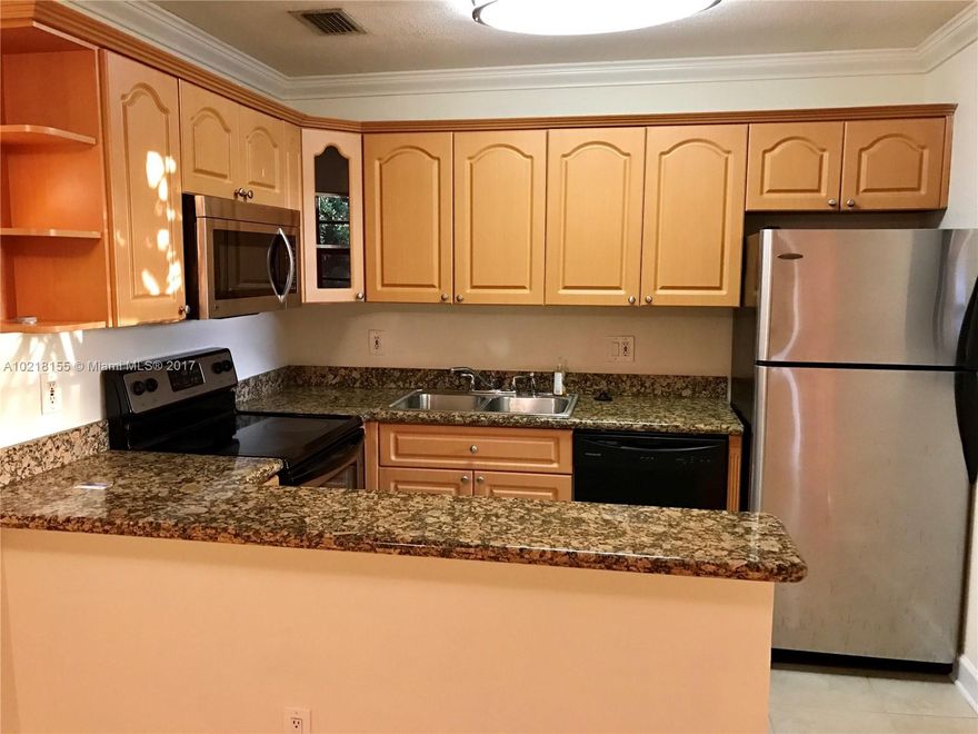 Great 1/1 condo located one east side of I95 in Coral Ridge Isles. Open Style Kitchen with granite counter and stainless steel appliances.  Community pool and laundry facilities located in the building. Dockage available. Pets under 20#. Other units available.