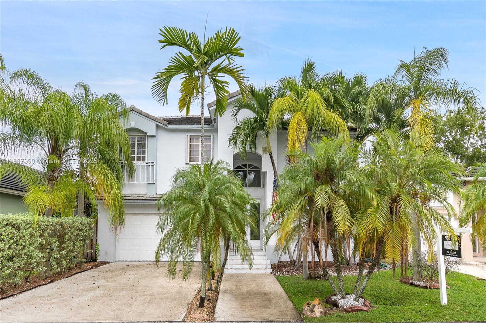 THIS HOME WILL SURELY TAKE YOUR BREATH AWAY! Undergoing NEW ROOF INSTALLATION! This gorgeous 4 Bed/2.5 Bath property is in magnificent condition, renovated about 4 years ago. It features a beautiful and elegant kitchen with high-end finishes, 2018 STAINLESS STEEL APPLIANCES, QUARTZ Countertops, WHITE CUSTOM-MADE cabinetry. Luxurious MARBLE FLOORING throughout. GAS Dryer, Range, and Water Heater. All WINDOWS and DOORS are FULLY PROTECTED with ACCORDION HURRICANE SHUTTERS. All the bedrooms are upstairs for PRIVACY. Beautifully designed bathrooms with exquisite taste and attention to detail, including CUSTOM-MADE CABINETS and DOUBLE SINKS. Located in a FAMILY-ORIENTED Community that offers excellent amenities which includes a SWIMMING POOL. Call now for a tour of this lovely residence!