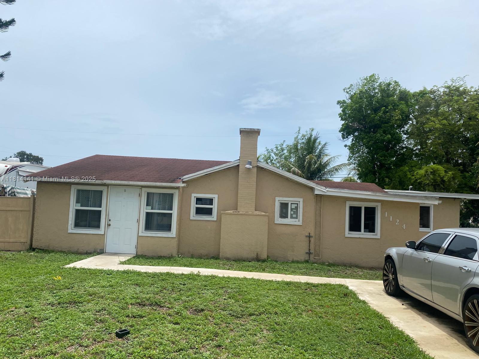 1124 Nw 100th Ter, Miami, Broward County, Florida - 4 Bedrooms  
3 Bathrooms - 
