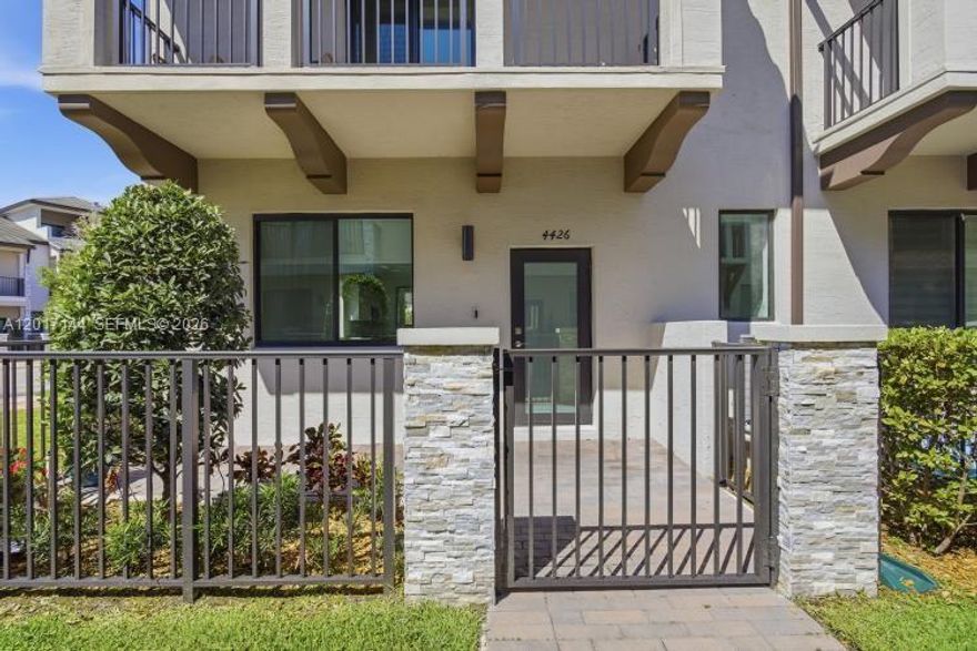 Corner 3-level townhouse in the highly desirable Urbana at Downtown Doral, offering modern luxury living in a prime location in the heart of Downtown Doral. This residence features a bright open-concept first floor with a contemporary kitchen, quartz countertops, and stainless-steel appliances, ideal for both everyday living and entertaining. The second floor offers a spacious primary suite with his-and-her walk-in closets, along with two additional bedrooms that share a full bathroom, plus a convenient full-size washer and dryer. The home is filled with natural light, high ceilings, and excellent cross ventilation throughout, enhancing the open and airy feel. Multiple outdoor spaces include balconies and two large terraces. The top floor features a spacious terrace with a built-in BBQ area, perfect for entertaining and enjoying sunset views. Residents enjoy exclusive access to Urbana’s resort-style amenities, including a pool, spa/jacuzzi, state-of-the-art fitness center, indoor basketball court, and children’s splash pad, providing a complete lifestyle experience in one of Doral’s most vibrant communities.