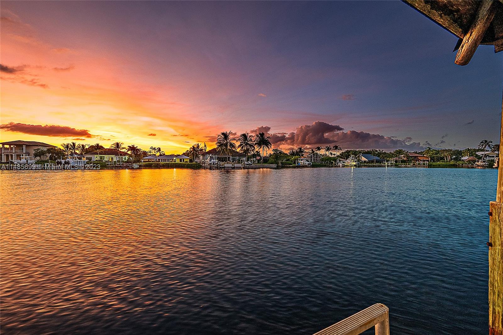 Welcome to the beautiful tranquil community of River Ridge. This lovely home has the most spectacular wide water views of the river, a spacious kitchen that opens to the family room, a fabulous large primary suite with den/office space all overlooking the pool and fantastic backyard. From almost every room, you'll have incredible views of the river. There is a large bonus room for guests, and private dock and lift. Enjoy endless sunset sky evenings. This home is truly a great family home!