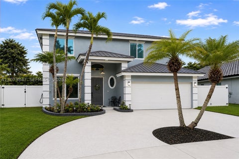Photo of 5840 SW 102nd Ave, Cooper City, FL 33328 (MLS # A12079847)