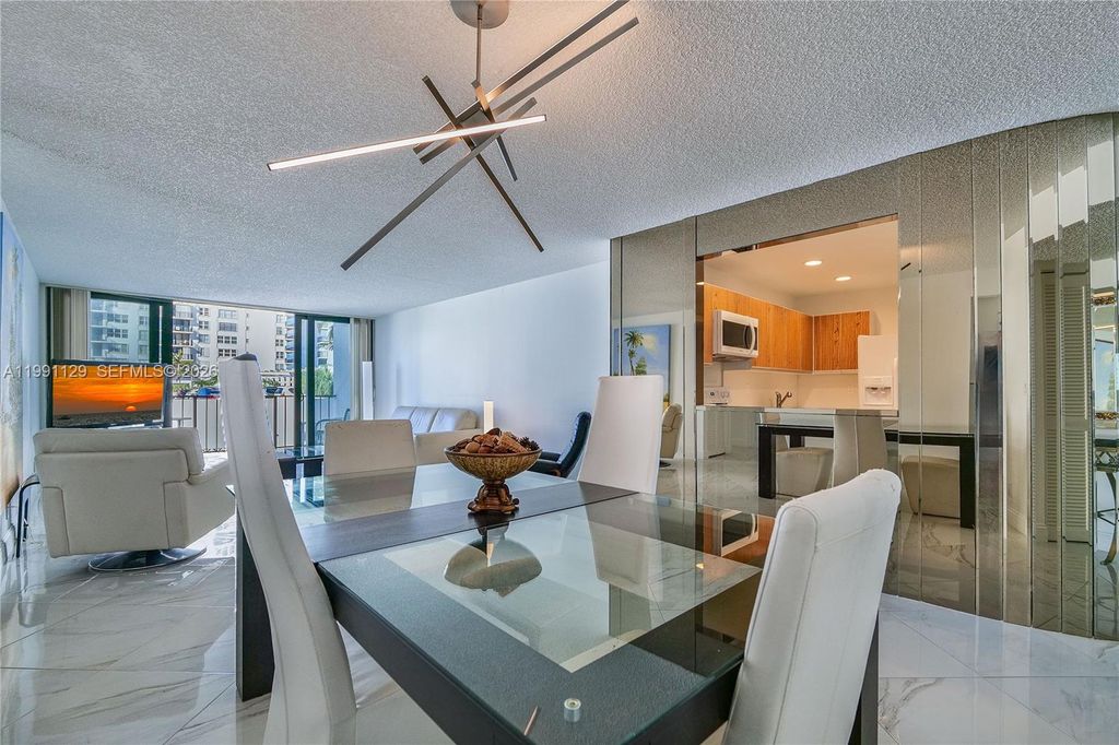 Photo of 2401 S Ocean Dr #305, Hollywood, FL 33019 (MLS # A11991129)