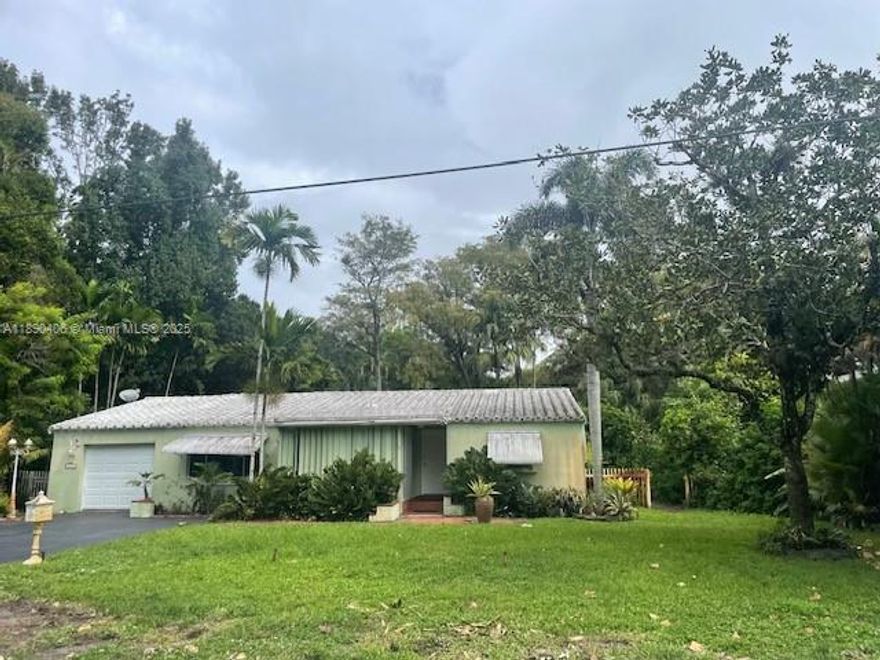Definitely one of a kind. Acre plus in beautiful Plantation neighborhood. Built in 1949. Renovate and restore to your design and decorating. Great investment in this well-established, high-demand area. Like walking back in time. There Is NO Home Owners Fee Here. NO HOA!