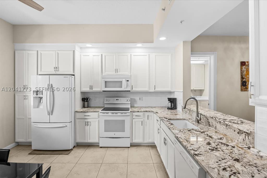 Photo of 38 Harbour Isle Dr E #104, Fort Pierce, FL 34949 (MLS # A12041773)