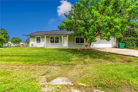 Photo of 1131 SW London Ln, Port St Lucie, FL 34953 (MLS # A12107094)