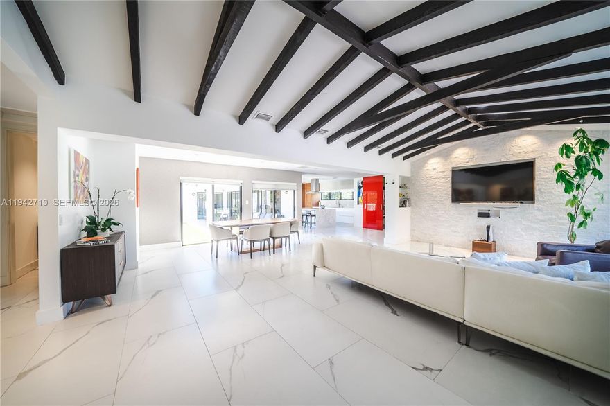 Discover his stunning, move-in-ready home located in the heart of coveted Miami Shores. Designed for today’s lifestyle, the open-concept floor plan is filled with natural light and enhanced by high-impact windows and doors throughout. The custom Italian kitchen serves as the focal point of the home, featuring a large island, premium appliances, and effortless flow to the outdoor patio. Notable features include a luxurious primary suite, oversized bedrooms, new solar panels, a saltwater heating pool, EV charging station and more. A truly distinctive property offering style, comfort, turnkey home in a prime location.