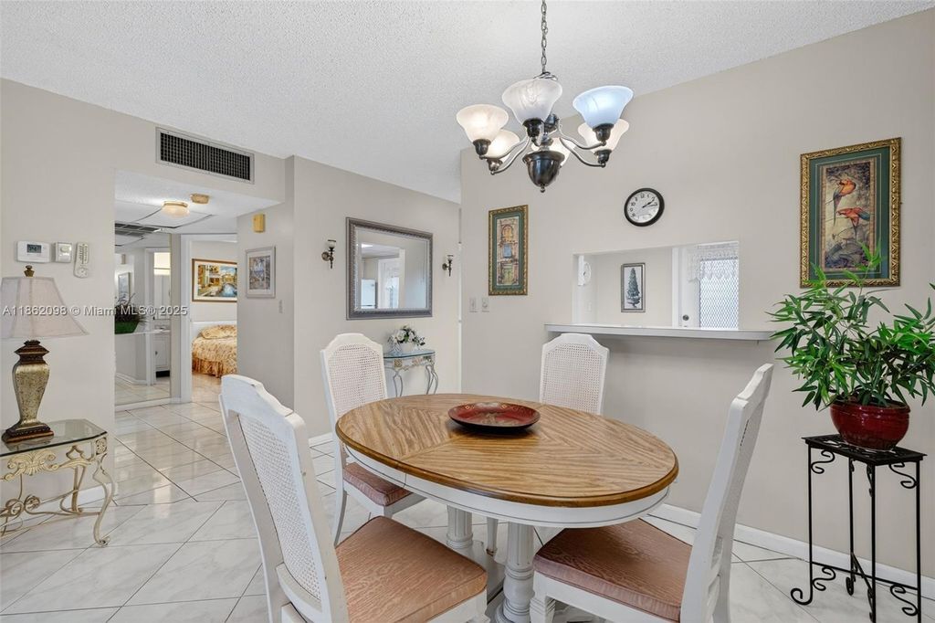 Photo of 4706 NW 36th St #402, Lauderdale Lakes, FL 33319 (MLS # A11862098)