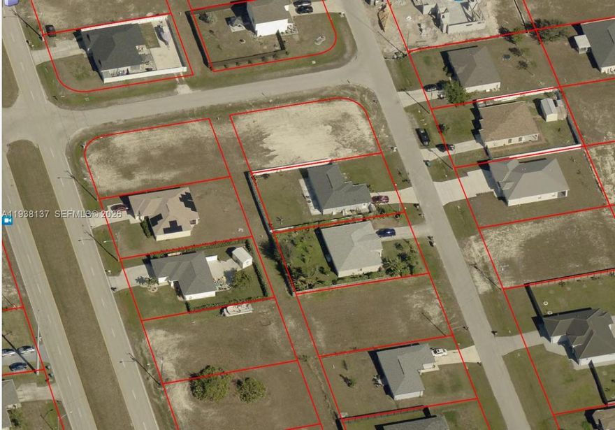 Corner lot available to build a residential house in Cape Coral. Owner motivated to sell.