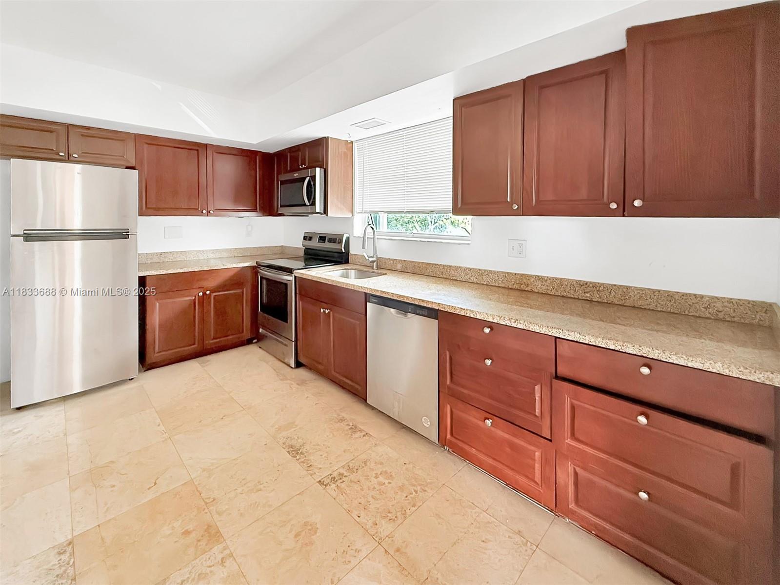Spacious Layout: 2 bedrooms, 1 bathroom
Ample Storage: Generous closet space throughout
Modern Kitchen:With abundant cabinets and a cozy breakfast nook
Dedicated parking space included
Waterfront Access:Tranquil water views and boat slips available for rent
Prime Location: Located in the heart of Miami Shores, within a peaceful and charming neighborhood
Nestled within a peaceful and charming neighborhood, this property presents a fantastic opportunity to enjoy the best of Miami Shores living.
This property is an excellent place to call home. Don't miss the chance to experience the serene lifestyle offered here.