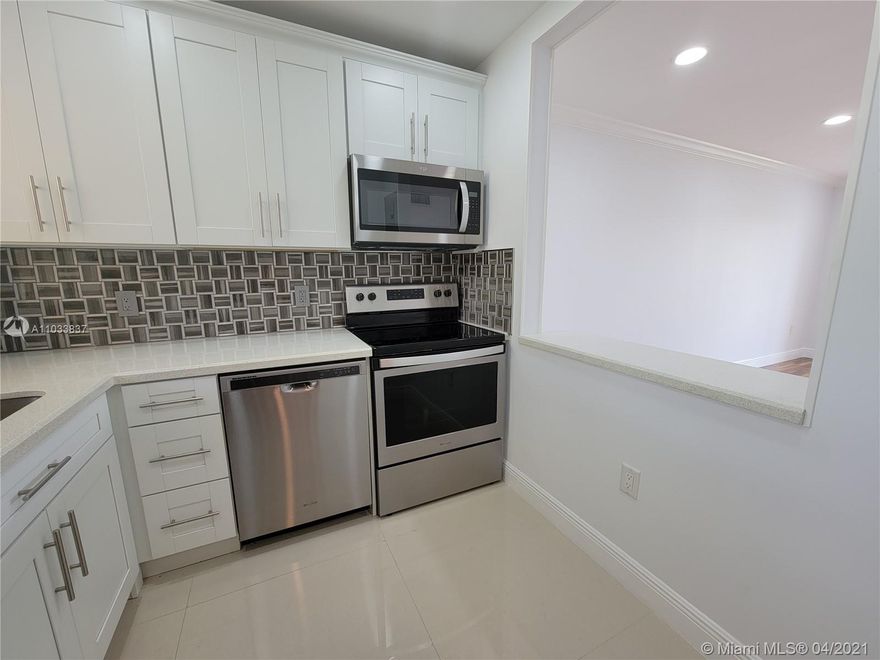 (Housing for Older Persons 55+ ) Turner Key  Totally tastefully remodeled.  This 1/1 unit features a New Kitchen Opened Up with New Cabinets Quartz Counter tops . New  Stainless still appliances. Totally updated bathroom, Newer tile floors. Fresh paint . New air conditioned and pass-through heater. Water views. Nothing to Do Here. The best part is that the assn low maintenance includes . NO Rentals 1st year/NO Pets.   * Close to Wal-Mart Super Center, Groceries, Pharmacies, minutes from Fort Laud and Sawgrass Mall.