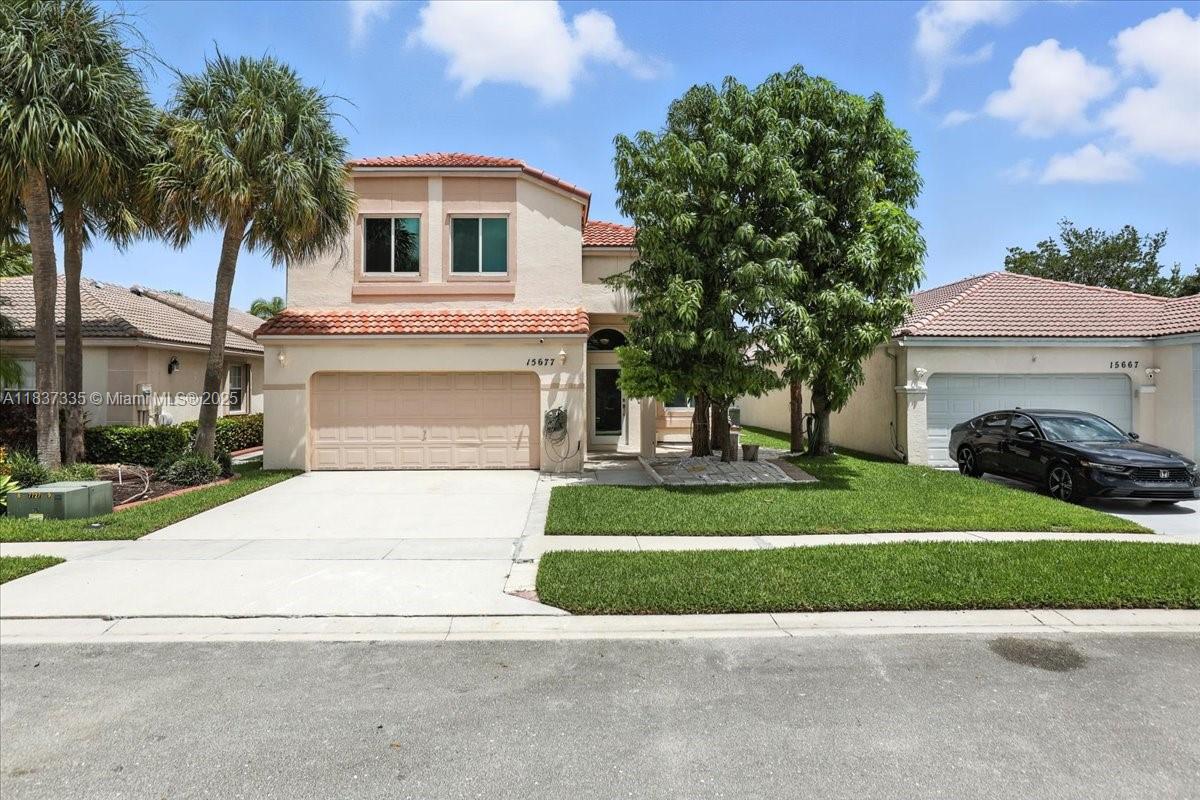 Welcome to your dream home in the highly sought-after gated community of Cherry Bay at Towngate in Pembroke Pines! This stunning 3-bedroom 2.5-bathroom residence laundry room & a 2-car garage.Step into a beautifully large fenced backyard with lush mango trees with plenty of space for your future pool & outdoor entertaining. The open kitchen flows into the inviting family room & dining area, perfect for family time.Featuring a newer roof installed in 2022, this home is equipped with complete impact windows & doors.Residents enjoy the benefits of gated and roaming security, and community amenities including pools, club room & playgrounds. Enjoy top-rated schools, close to Silver Palm Elementary.