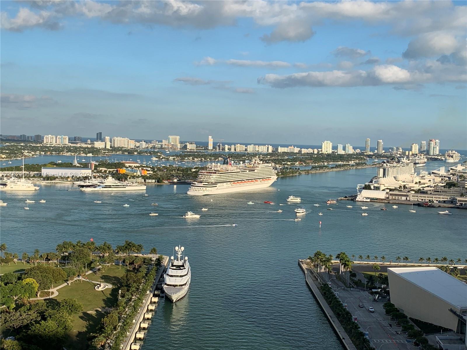 Totally remodeled unit with upgraded appliances and new AC in prime location in this sought after building with stunning unobstructed views of the bay. Enjoy watching the cruise ships as they depart. This 1/1 1\2 residence features floor-to-ceiling windows and a balcony with electric shades. Master Bathroom has a Roman Tub, Shower Combo. 1 assigned parking space and storage locker. Great amenities including putting golf, 2 heated swimming pools, hot tub, fitness center, BBQ area, sand volleyball court, business center, 24-hr concierge & valet parking.