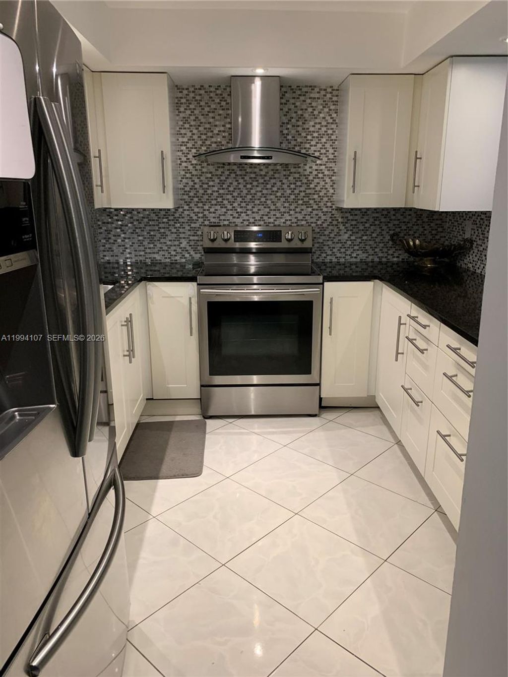 Photo of 501 Three Islands Blvd #108, Hallandale Beach, FL 33009 (MLS # A11994107)