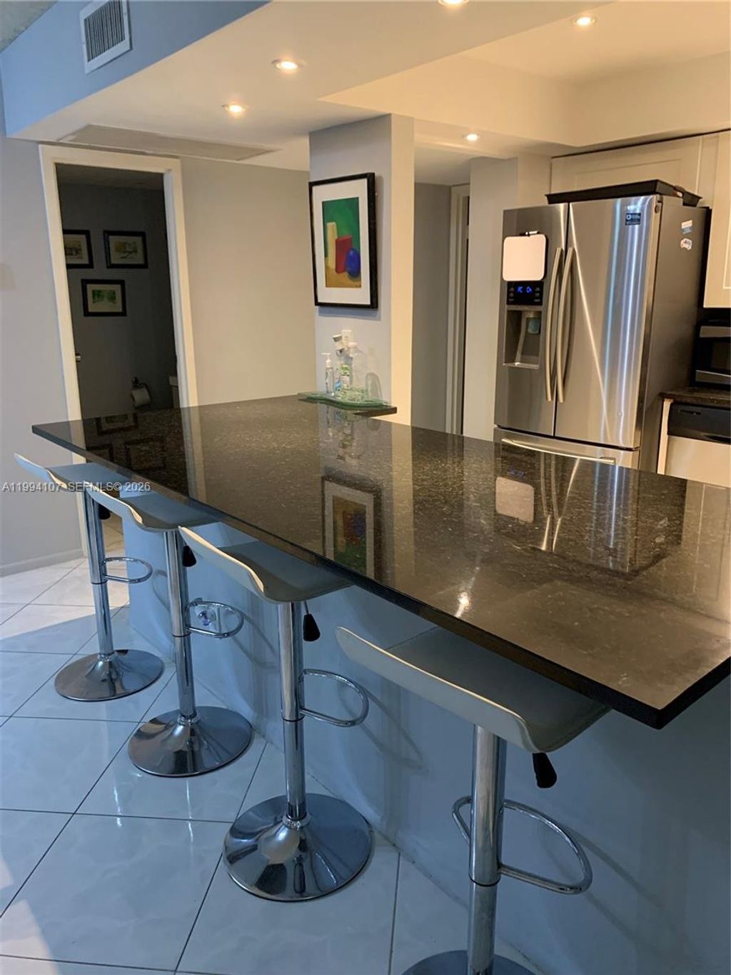 Photo of 501 Three Islands Blvd #108, Hallandale Beach, FL 33009 (MLS # A11994107)