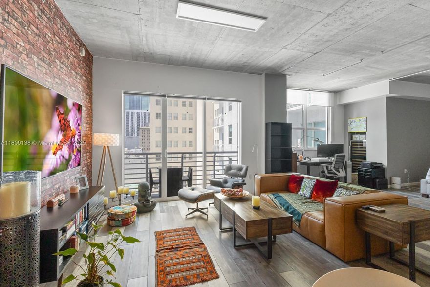 Magnificent and spacious, largest one bedroom in the building, fully furnished! Walk into this loft residence which expands into a vast open concept featuring high ceiling, open kitchen, in-unit washer/dryer, large walk-in closet, and for the wine enthusiasts also comes equipped with a wine refrigerator! Lots of natural light, this floor plan is unique, only one available per floor. Building features 24-hr front desk attendant, secured entry, roof top pool and gym, downstairs lap pool in serene setting, rec room and more. Walking distance to the Arena, Bayside Market Place, Theaters and Colleges. Easy access to Brickell, and just minutes to South Beach. Be part of the Urban movement, make Downtown Miami your home. Call now! Parking not included in rent, $60 monthly. Short term prices vary