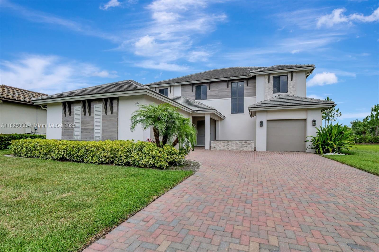 Seller offering $20K toward buyer’s closing costs with a full price offer! This rare Inlet model in Maple Ridge at Ave Maria features 4 beds, 3.5 baths, a loft, and 3-car garage across nearly 4,000 sq ft of living space (5,061 total). The grand great room flows into an open kitchen, and all bedrooms include walk-in closets. The owner’s suite boasts dual walk-ins and water closets. The loft offers space for media, office, or lounge. Enjoy a covered terrace, access to a clubhouse, resort-style pool, gym, and more—on a 65-ft lot near parks, shops, and dining. *Rooms are virtually staged.*