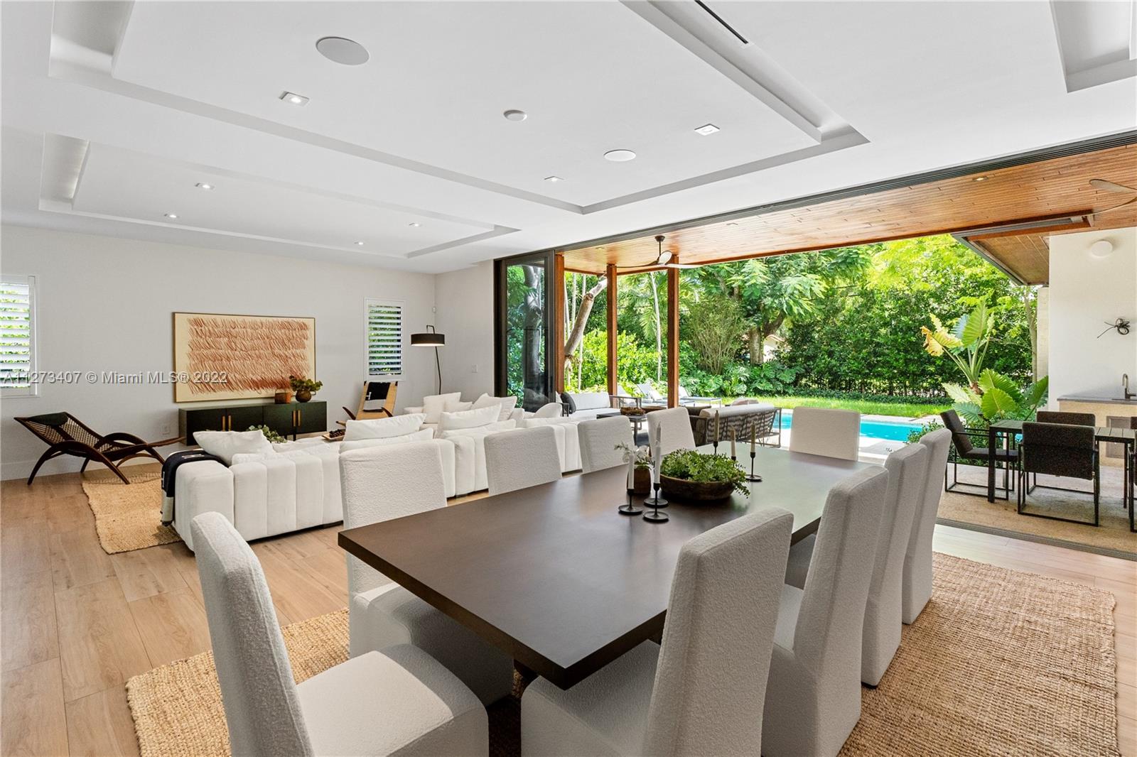 Beautiful custom built home in South Miami offering perfect indoor-outdoor entertaining areas. This 2020 construction provides for an open floor plan divided by a modern glass wine room. There are 4 bedrooms with en-suite bathrooms and walk-in closets located on the 2nd floor and a guest suite on the first floor. This homes features impact windows through out, gas range and a large covered terrace with built-in grill. The property comes with a 2-car detached garage, and a custom shallow pool at the entrance. Ideally located near most of Miami's top rated private schools. This home is also available to rent furnished for $30,000 per month.