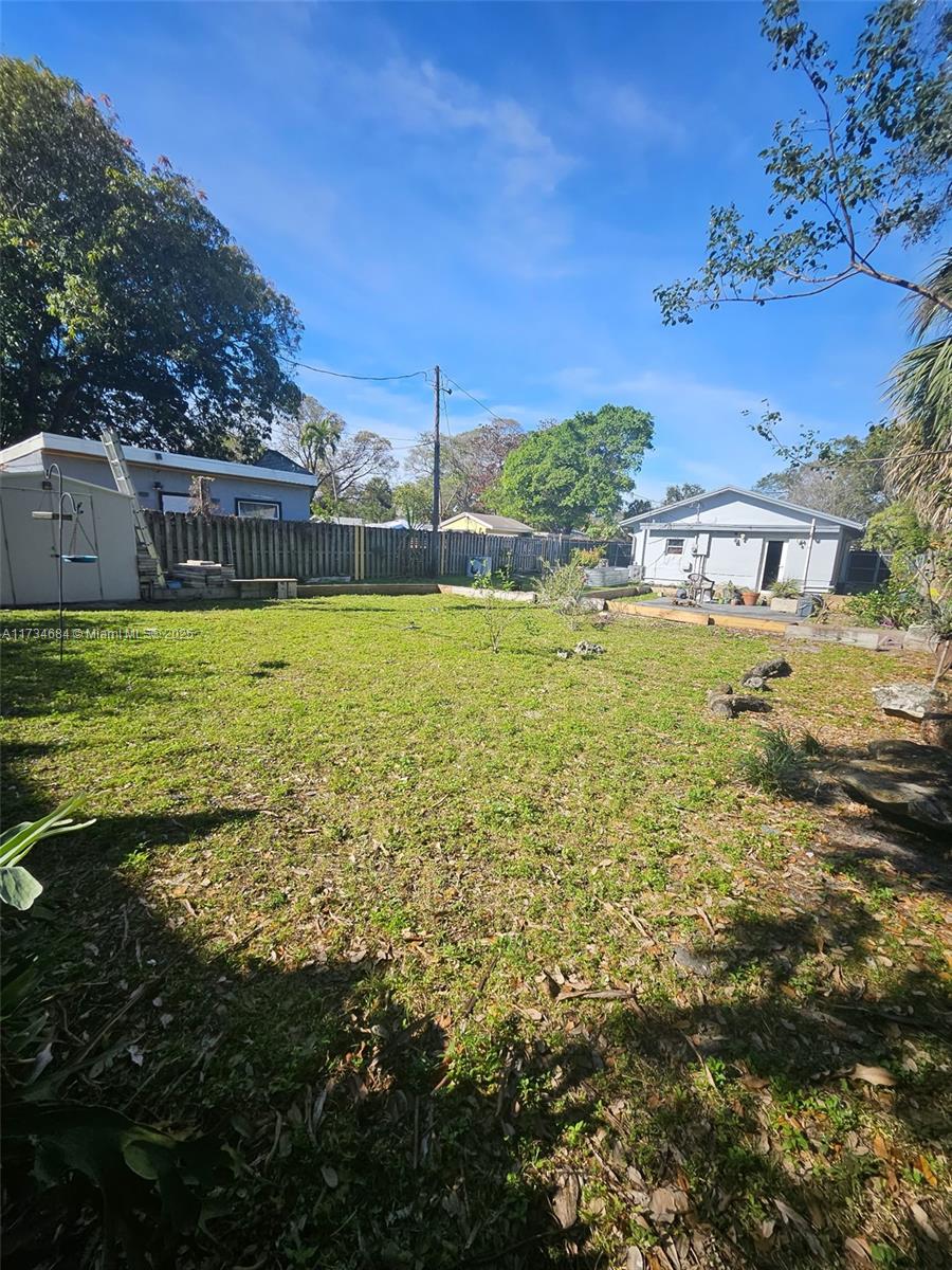 Introducing a meticulously renovated, no expenses spared, 3-bedroom, 2-bathroom gem. Enjoy brand new hurricane impact windows and doors, as well as stylish kitchen and bathrooms (2023), a tankless water heater (2022), and updated electrical and flooring (2020). The roof and HVAC (2017) offering a worry-free stay. Located on a very generous lot with endless potential, this home's prime location offers a 5-minute drive to the major highways and a 10-minute drive to the beach and restaurants, giving easy access to shopping centers, schools, and parks?perfect for families or investors. (Currently split as 2/1, main house and 1/1 efficiency generating great income, that can easily be converted back by the seller prior to closing.) Don't miss out on this move in ready property.