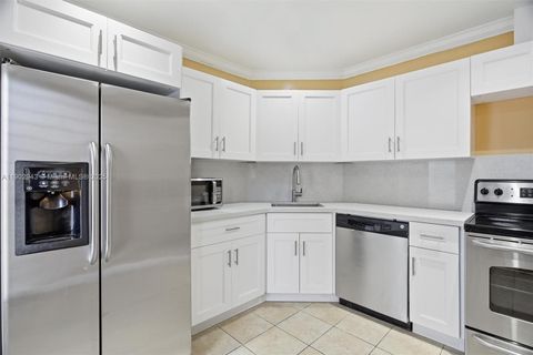 Photo of 6300 S Falls Cir Dr #212, Lauderhill, FL 33319 (MLS # A11902943)
