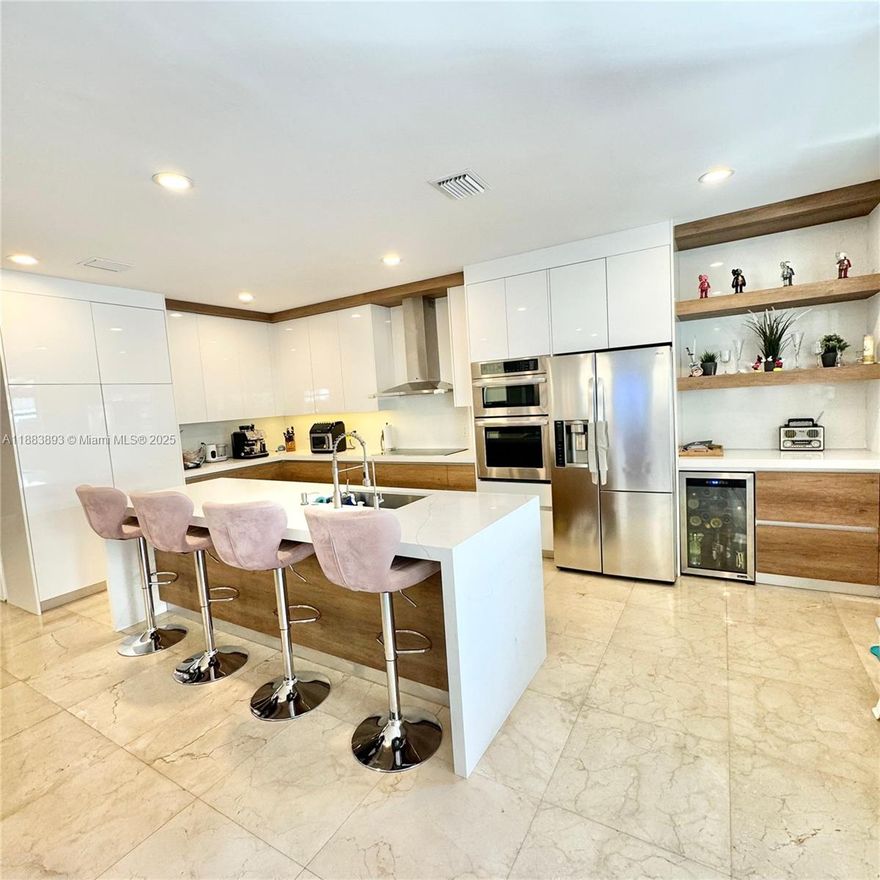 Stunning 4BD/2.5BA residence with 2-car garage, fully renovated in a quiet community. Marble floors flow throughout spacious living areas and oversized walk-in closets. The brand-new chef’s kitchen is a centerpiece, while a built-in BBQ and luxury-finished garage with porcelain floors and custom storage add to the appeal. Smart-home features, high-tech washer/dryer, and a whole-house Aquafeel purified water system elevate comfort. A perfect blend of tranquility and sophistication—move-in ready and designed to impress