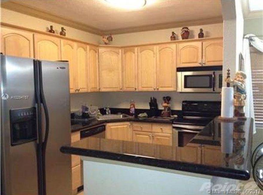 Rarely available biggest and best one bedroom floor plan of the complex in the heart of Victoria Park. This condo features stainless steel Whirlpool appliances including dishwasher, new black granite counters and crown molding-Bambo wood floors in the living area and tile throughout-Large master bedroom with walk-in closet including central air and new Washer & Dryer inside unit. Private, elevator equipped, gated building with a heated pool next to 99 acre Holiday Park as your extended backyard. Enjoy biking , tennis courts, basketball courts, soccer fields, etc. You can't beat the location as you will be  minutes away from Fresh Market, Publix, Galleria Mall, restaurants, walking distance to Downtown, Beach & Las Olas Blvd. Cable and water included. Hurry!