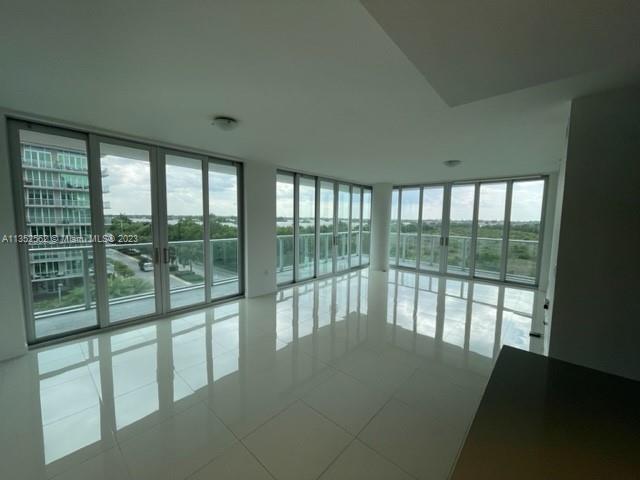 Corner 3 Bedroom unit with Den and 3.5 bathrooms with 2 assigned parking spaces. Over 2000 SF unit featuring 9' ceilings, modern floor plan, porcelain tiles, quartz countertop, stainless steel appliances and floor to ceiling windows, A must see! The unit also has an oversized refrigerator, Italian cabinetry, high impact windows and doors. Storages available for additional cost. Two assigned covered parking spaces. Restaurants and retails shops on the building ground floor; Best schools, parks and major highways within minutes. UNIT AVAILABLE on March 31st!