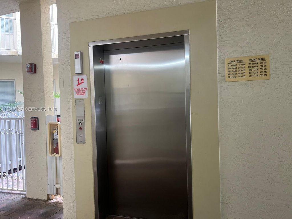 Photo of 3500 Oaks Clubhouse Dr #211, Pompano Beach, FL 33069 (MLS # A12017137)