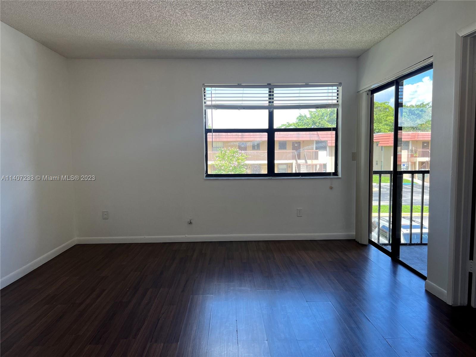 Apartment located on the 2nd floor in a quiet community. Spacious floorplan with sleek white cabinetry, complimented by natural lighting. Washer/Dryer inside unit and a screened balcony. Nearby is a shopping center with a supermarket, restaurants, public library, and more.