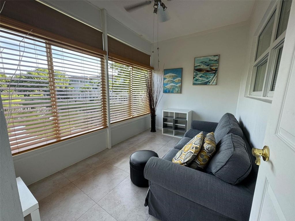 Photo of 3430 NW 52nd Ave #207, Lauderdale Lakes, FL 33319 (MLS # A11775356)