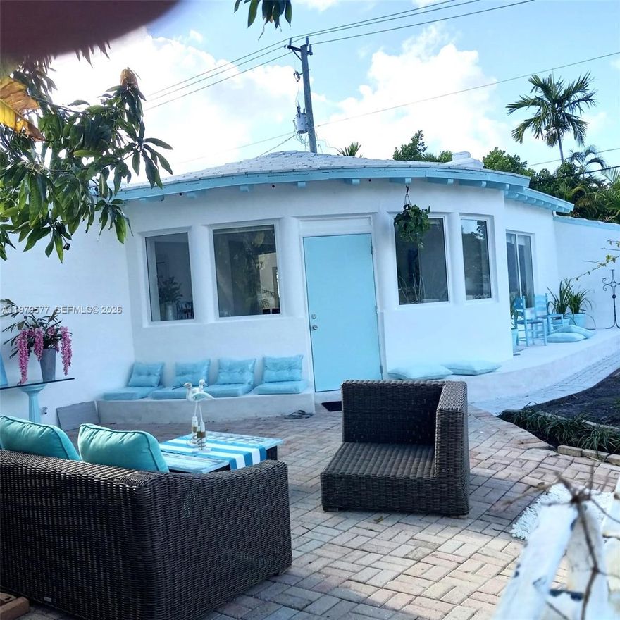 Beautiful corner home in Sough after Normandy Isle. This corner lot has 2 bedrooms, 1 bath a Large Garden, walking distance to the beach, new roof and impact windows. This house is a charm, partially furnished. Adjacent studio separately rented.