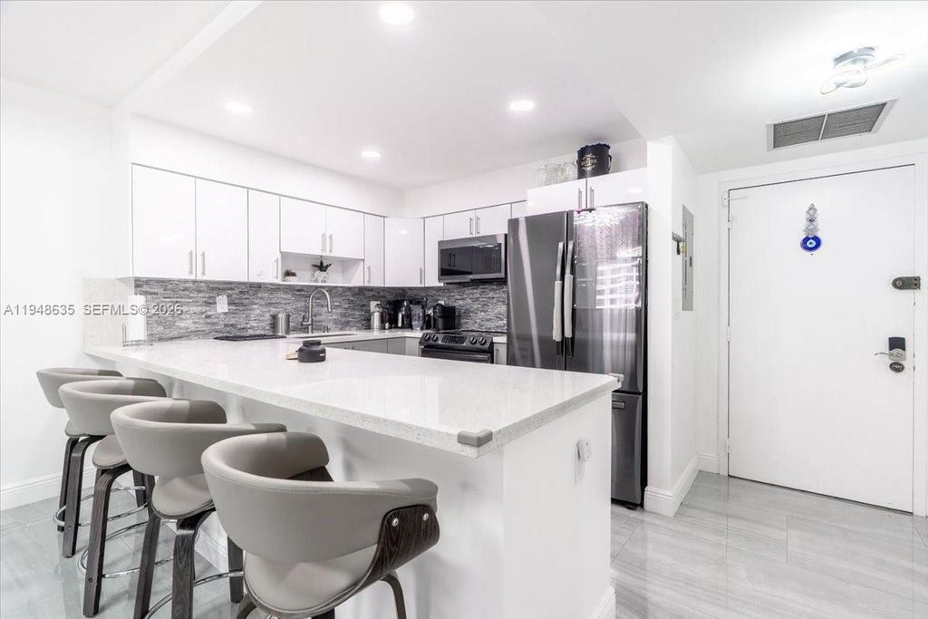 Photo of 600 Three Islands Blvd #1413, Hallandale Beach, FL 33009 (MLS # A11948635)