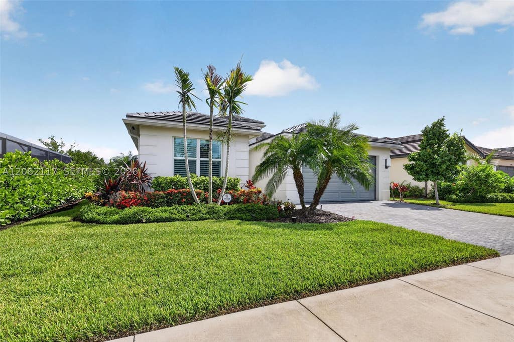 Photo of 11996 SW Seahorse Springs Ter #0, Port St Lucie, FL 34987 (MLS # A12062117)