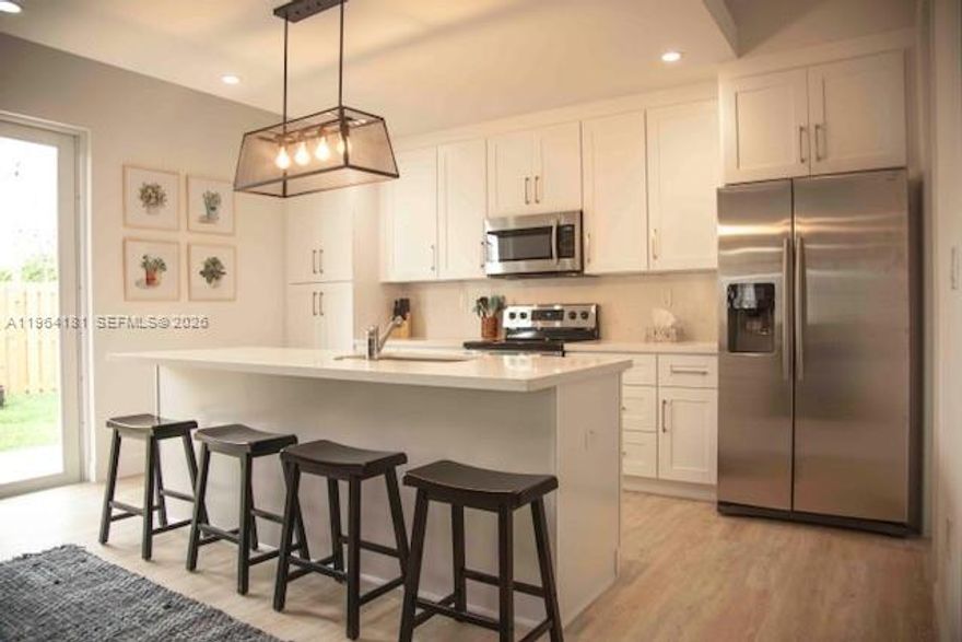 Fantastic 2 story pool home with 6 bedrooms!  This open concept living area and kitchen has plenty of space for large families and entertaining.  2 bedrooms and 1 bath on first floor with separate entry is perfect for inlaws. Kithcen features snack counter and SS appliances. Large master bedroom with walk-in closets and spacious master bath features soaking tub, double sinks and shower. Laundry room. 2 car garage has a mini-split system and finished floors that can be used as a playroom, man cave or to store your luxury cars. Impact windows and doors. The pool and patio area is great for gatherings. Roof and A/C are 2018 - only 7 years old.  Vivnit Security cameras. On side of the house is paved area large enough for RV or boat. No HOA!  This home has it all!