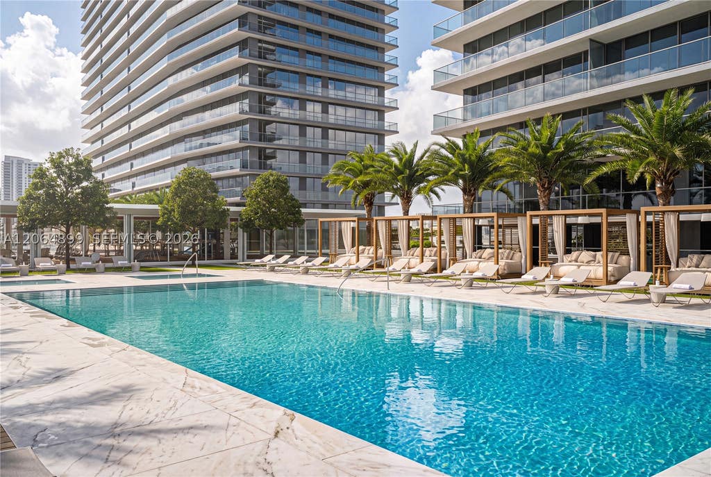 Photo of 1179 E Hallandale Blvd #302, Hallandale Beach, FL 33009 (MLS # A12064899)
