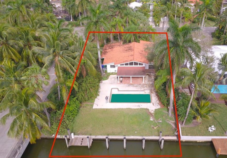 Corner lot tear down in the heart of Belle Meade Island! A gated community within a gated community. Create your own oasis on the 12,375 sq ft lot with its own private boat dock located on the canal right off the intercoastal waters.