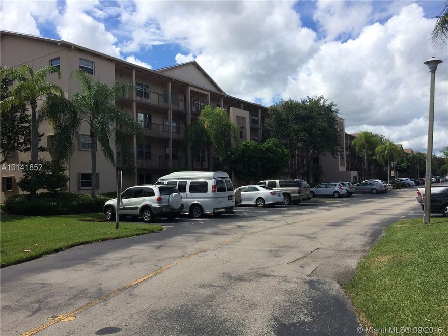 CENTURY VILLAGE BUCKINGHAM EAST, FIRST FLOOR,CORNER,SCREENED PORCH,HURRICANE SHUTTERS,OVERLOOKING THE GOLF COURSE AND LAKE,THE LARGE "M" MODEL BEAUTIFULLY UPGRADED WITH NEW LAMINATE FLOORING IN ALL LIVING AREAS, AND TILE IN THE KITCHEN,GRANITE COUNTER TOPS, NEW SINKS,CABINETS, UNIT PAINTED, NEW BLINDS, EAT IN KITCHEN,WALK-IN CLOSETS.AMMENITIES INCLUDE COURTESY BUS, HEALTH CLUB, HEATED POOLS, CLUBHOUSE, GOLF,SOCIAL ACTIVITES, SHOWS, OK TO LEASE,LOW MAINT,MEDICAL,FIRE, POLICE ALERT BUTTONS . ADULT COMMUNITY