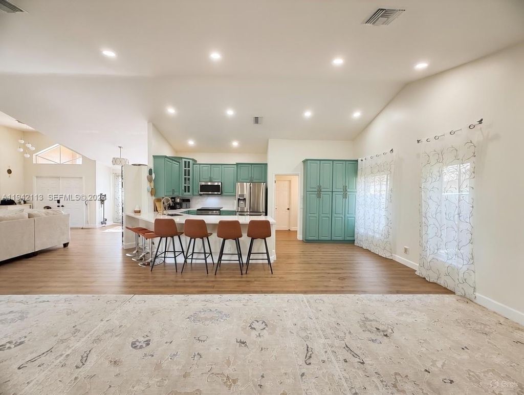 Photo of 12585 SW 9th Pl, Davie, FL 33325 (MLS # A11942113)