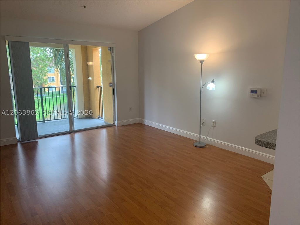 Photo of 2240 E Preserve Way #302, Miramar, FL 33025 (MLS # A12063862)