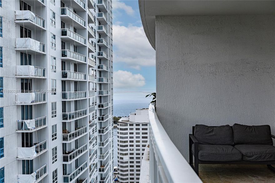 Stunning 1-bedroom, 1-bath condo located on the 26th floor of the prestigious Plaza on Brickell. This spacious corner unit offers 774 SF of beautifully maintained living space with breathtaking bay and skyline views from every angle. Features include floor-to-ceiling impact windows, marble and wood flooring, an open balcony, and a modern kitchen equipped with stainless steel appliances, granite countertops, and built-ins. The primary bath offers dual sinks, a soaking tub, and separate shower. Unit includes 1 assigned parking space and washer/dryer in-unit.