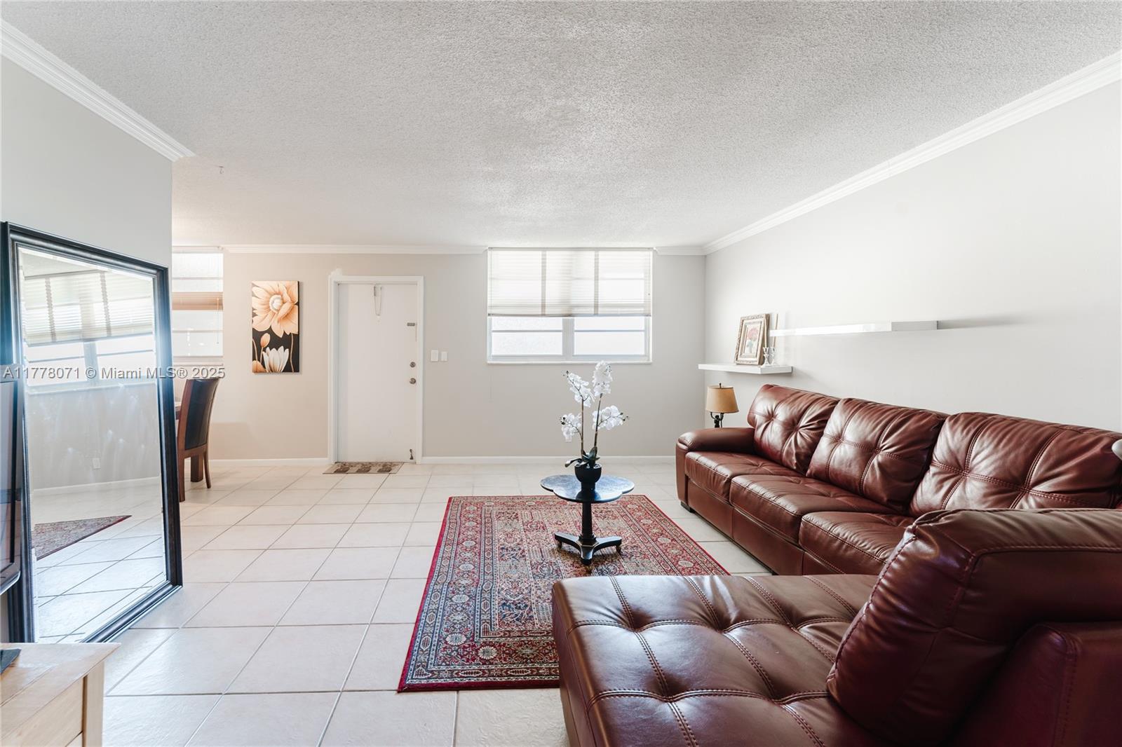 Beautiful and spacious 1-bed, 1.5-bath condo,perfect as your primary home or an investment opportunity!All ages welcome, and rentals are allowed. The unit features tile floors throughout and a illuminated,carpeted bedroom with two walk-in closets,one of which can be converted into a den.Additional storage room.A/C replaced in 2018;water heater in 2014.
The well-maintained building offers a serene common area, storage rooms,bike storage, and laundry facilities on each floor. Enjoy a secured lobby entrance and a prime location that ensures comfort and peace of mind.The assigned parking space is covered and protected-no concerns about weather or flooding.The building has completed its 50-year recertification.Maintenance fee includes master insurance and reserves.MOTIVATED SELLER!