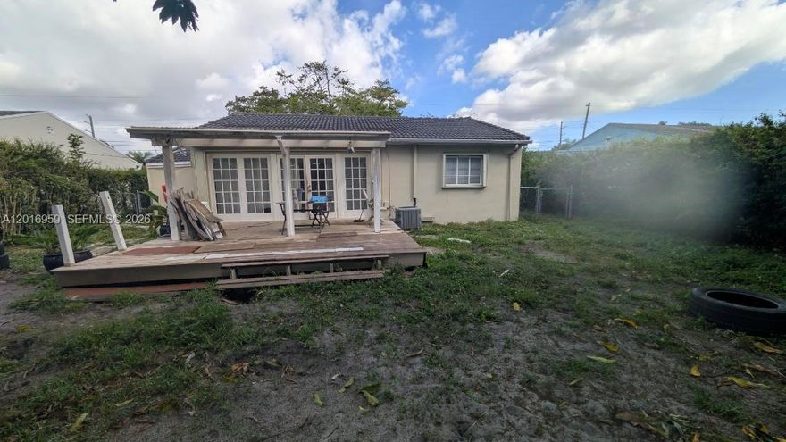 This 1200+ SQFT 2 Bed and 1 Bath home, seating on a 8K land in the hottest market in Hollywood Florida, It is a rare opportunity. Well taking care off backyard and maybe in need of some repairs inside. Perfect relocation or first time home buyer.. Enjoy the outdoor living space with a generous backyard appropriate for entertaining or relaxing. Conveniently located near shopping, dining, and entertainment options, this property is a wonderful opportunity for comfortable living. Don't miss the chance to make it yours!