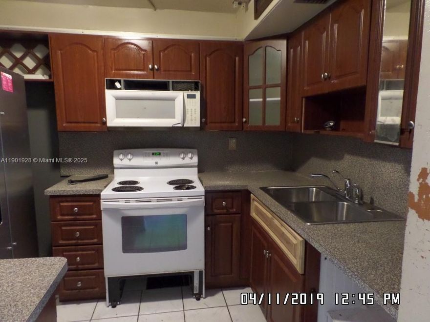 Sought after first floor unit. Spacious and bright with 1100 sqft and tile flooring throughout. Renovated main bathroom. Tub in second bathroom. Screened in balcony. Laundry facilites on premises. Hoa approval is needed, but it's rapid. **EQUAL HOUSING OPPORTUNITY**