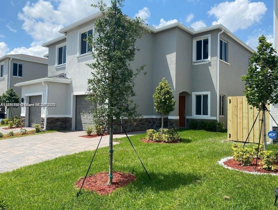 This stunning 3-bedroom, 2.5-bathroom townhome is nestled in a vibrant community, offering a blend of modern
living and convenience. The unit boasts energy-efficient appliances, a spacious backyard, and an attached garage,
making it an ideal haven for families and professionals alike.
