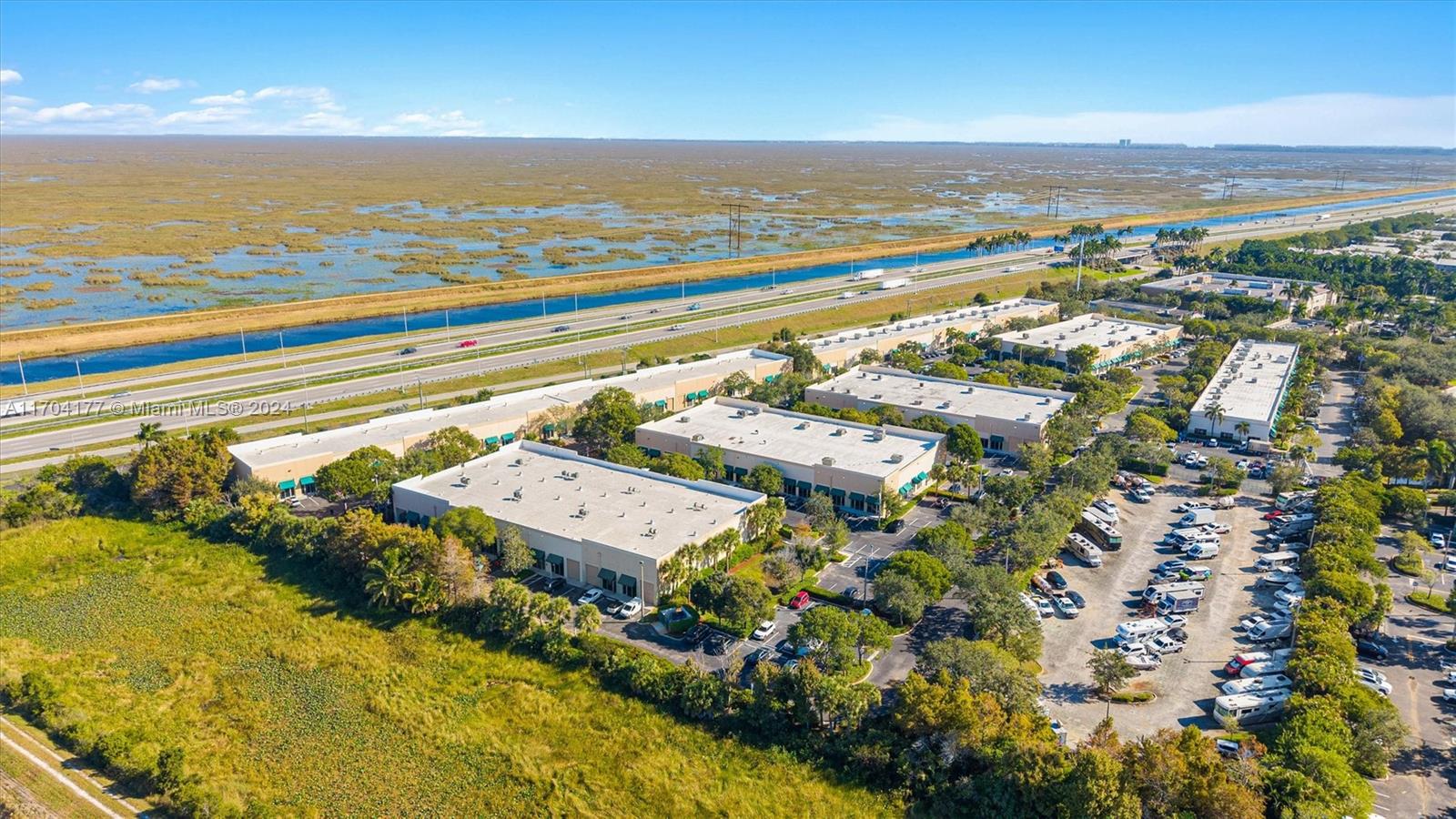 Fantastic opportunity in the heart of Weston! This flexible 1,508 sq. ft. office-warehouse space in the Weston Commercial Center is ready for your business. Customizable layout with an air-conditioned reception area and a spacious open bay with street-level warehouse access. Nestled in prime residential area, this convenient location offers easy access to major highways and just minutes away from Fort Lauderdale and Miami International airports. Available for immediate occupancy. Don’t miss out!