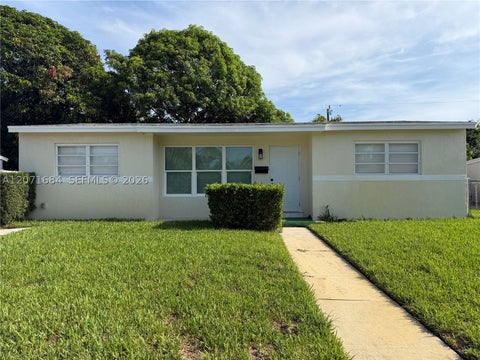 Photo of 1240 W 26th Ct, Riviera Beach, FL 33404 (MLS # A12071684)